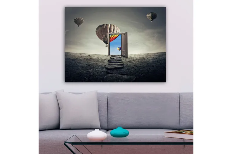 Lærred 70x100 cm - Åben dør, der fører til en farverig himmel med varmluftballoner, der svæver over et goldt landskab, Grå / Beige / Rød