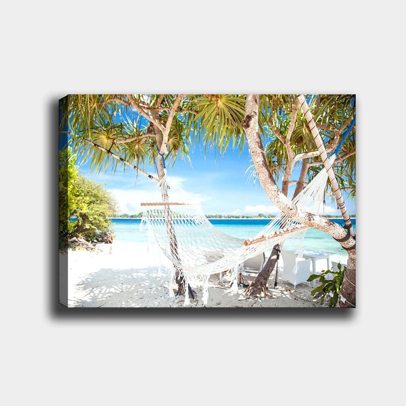 Lærred 70x100 cm - Afslappende hængekøje mellem palmer på en strand med turkisblåt vand og klarblå himmel - Hvid / Blå / Grøn - Boligtilbehør - Billeder & kunst - Billeder på lærred