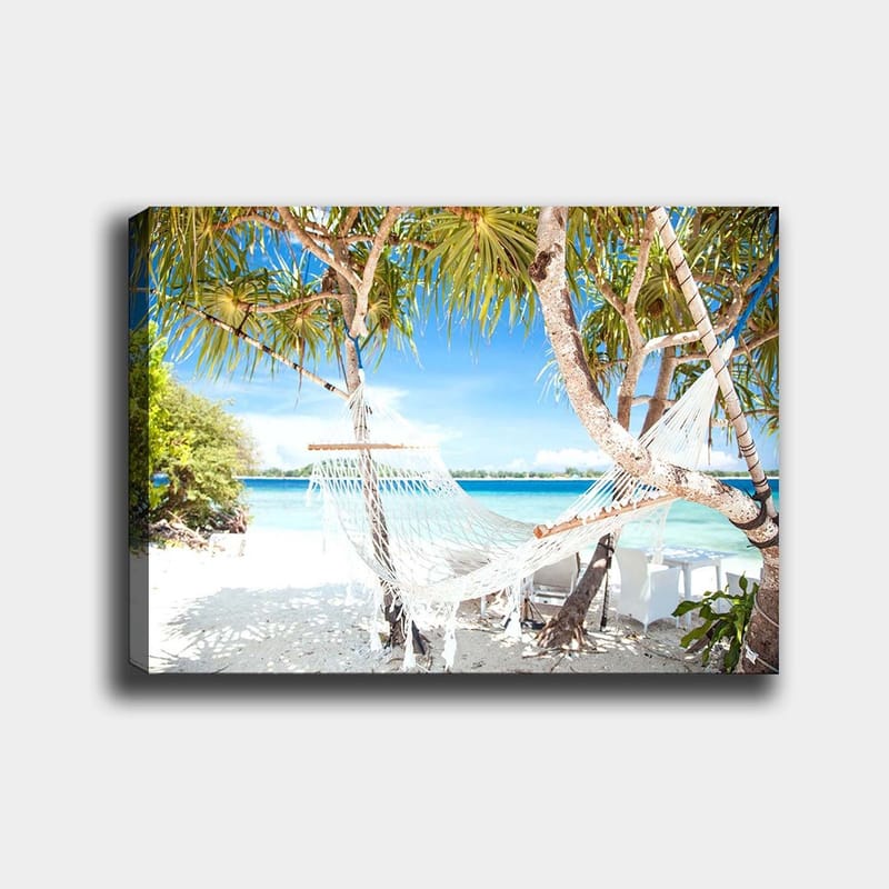 Lærred 70x100 cm - Afslappende hængekøje mellem palmer på en strand med turkisblåt vand og klarblå himmel, Hvid / Blå / Grøn