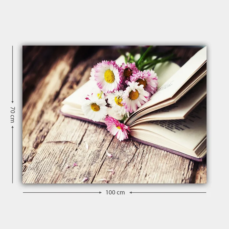 Lærred 70x100 cm - Blomsterbuket placeret på en åben bog - Hvid / Lyserød / Gul - Boligtilbehør - Billeder & kunst - Billeder på lærred