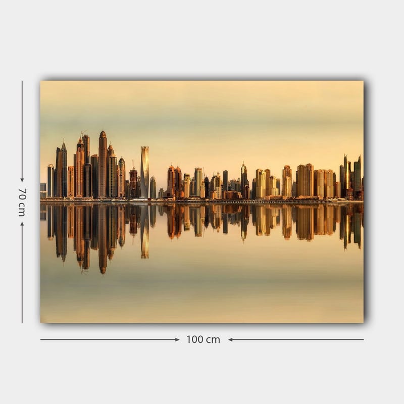 Lærred 70x100 cm - Byens skyline med moderne skyskrabere spejlet i vandet ved solnedgang - Guld / Orange / Beige - Boligtilbehør - Billeder & kunst - Billeder på lærred