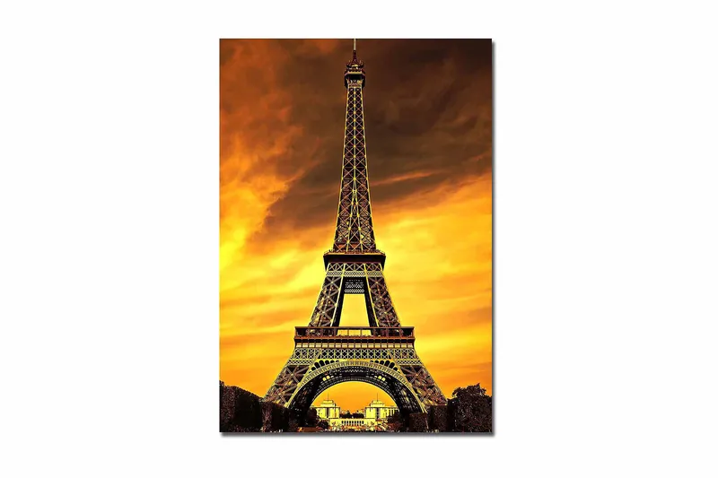 Lærred 70x100 cm - Eiffeltårnet mod en dramatisk solnedgang, Guld / Orange / Sort
