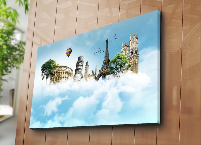 Lærred 70x100 cm - Fantasifuldt landskab med berømte bygninger, der svæver blandt skyer - Blå / Grøn / Hvid - Boligtilbehør - Billeder & kunst - Billeder på lærred