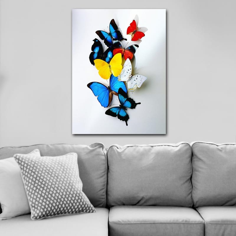 Lærred 70x100 cm - Farverig samling af sommerfugle i forskellige nuancer, der skaber en levende og dynamisk komposition - Blå / Gul / Rød - Boligtilbehør - Billeder & kunst - Billeder på lærred