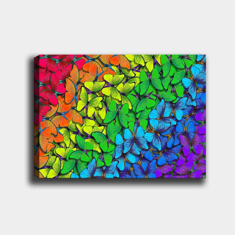 Lærred 70x100 cm - Farverig samling af sommerfugle i forskellige nuancer, der skaber en levende og harmonisk komposition, Grøn / Blå / Orange