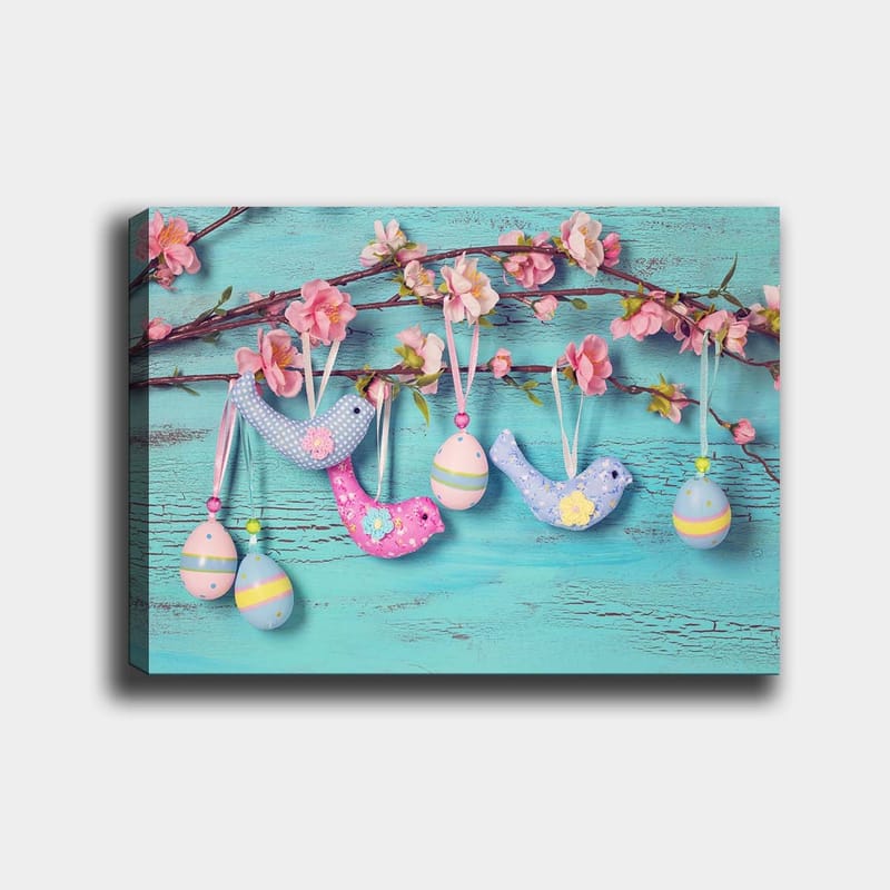 Lærred 70x100 cm - Farverige fugle og æg hængende på en gren med blomster - Blå / Lyserød / Grøn - Boligtilbehør - Billeder & kunst - Billeder på lærred
