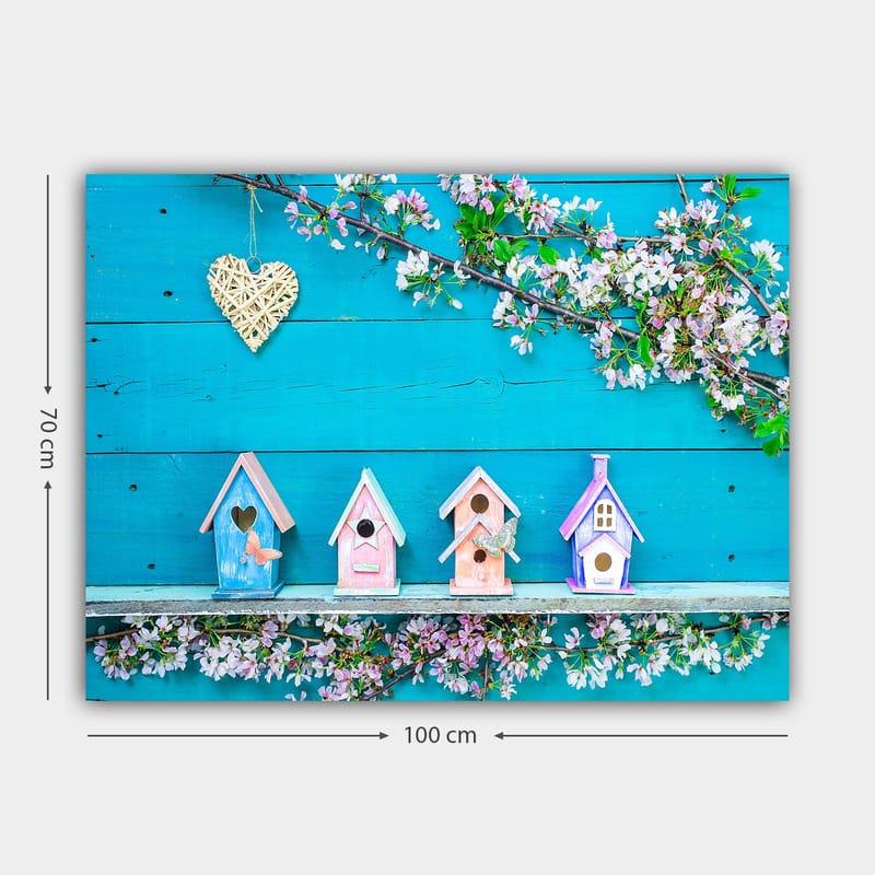 Lærred 70x100 cm - Farverige fuglehuse på en blå baggrund med blomster som dekoration - Blå / Lyserød / Hvid - Boligtilbehør - Billeder & kunst - Billeder på lærred