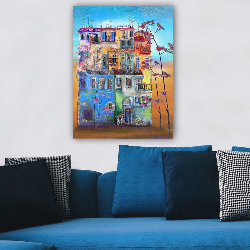 Lærred 70x100 cm - Farverige huse i et bymiljø med blomstrende træer i forgrunden - Blå / Grøn / Orange - Boligtilbehør - Billeder & kunst - Billeder på lærred