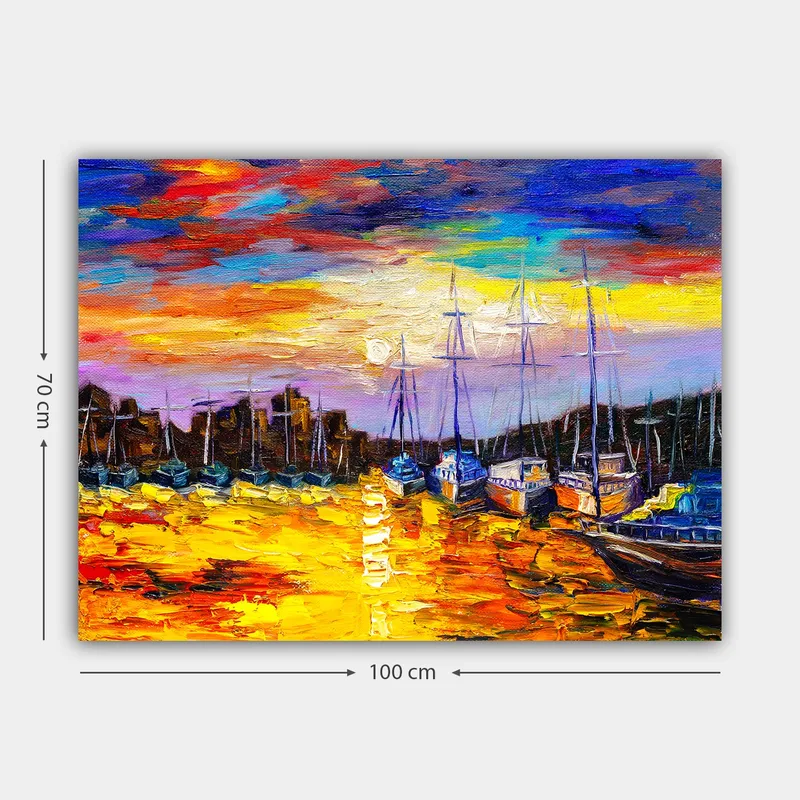 Lærred 70x100 cm - Farverigt havnescene med sejlbåde spejlet i vandet under en solnedgang - Guld / Blå / Orange - Boligtilbehør - Billeder & kunst - Billeder på lærred