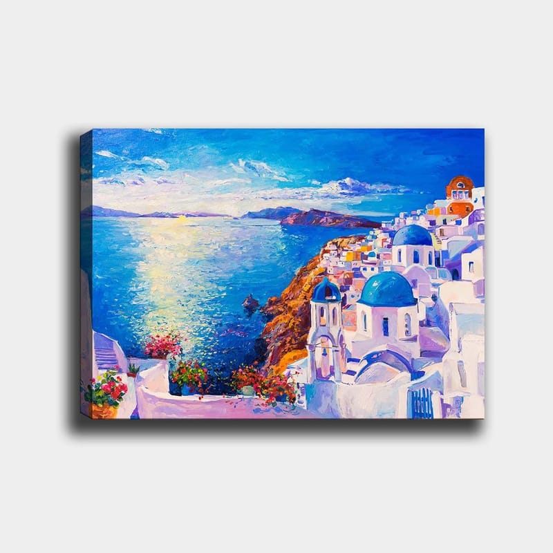 Lærred 70x100 cm - Farverigt udsigt over en græsk kystby med hvide bygninger og blå kupler, der strækker sig mod havet, Blå / Hvid / Orange