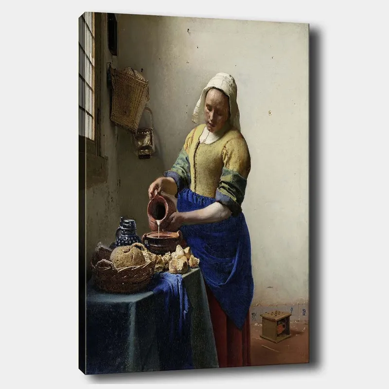 Lærred 70x100 cm - Kvinde hælder mælk i en skål i et lyst køkken, Blå / Gul / Brun