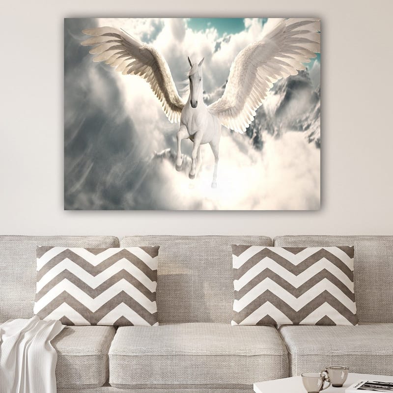 Lærred 70x100 cm - Majestætisk vinget enhjørning svæver gennem skyerne - Hvid / Lyseblå / Grå - Boligtilbehør - Billeder & kunst - Billeder på lærred