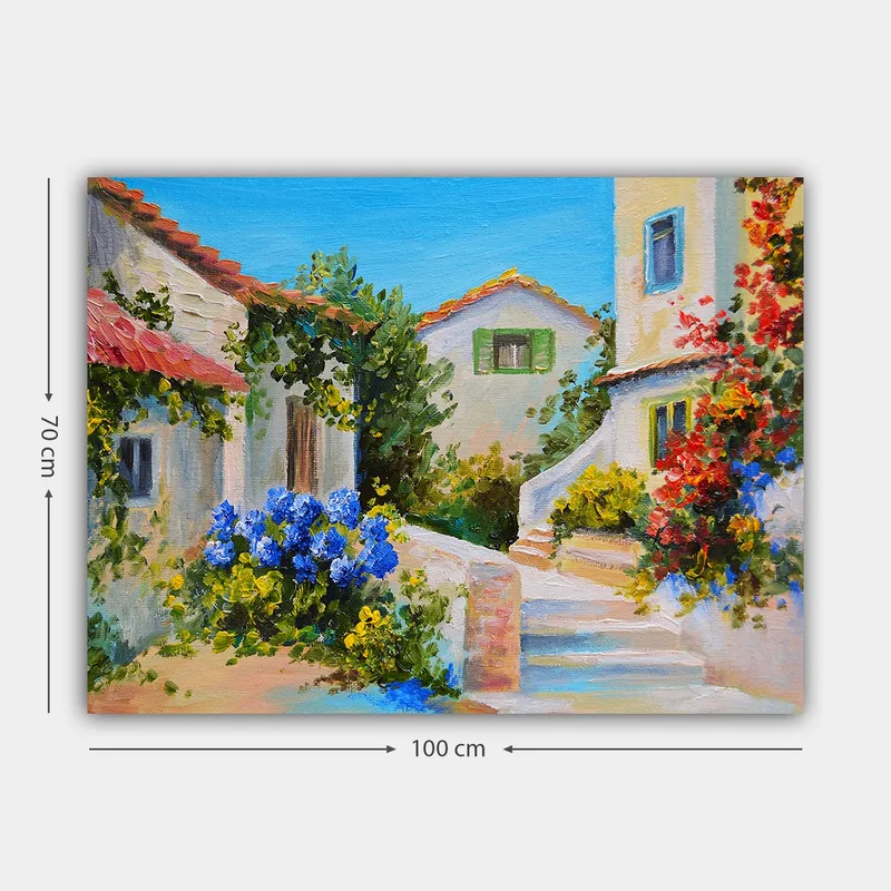Lærred 70x100 cm - Malerisk landsbyscene med farverige huse og blomstrende planter - Blå / Grøn / Gul - Boligtilbehør - Billeder & kunst - Billeder på lærred