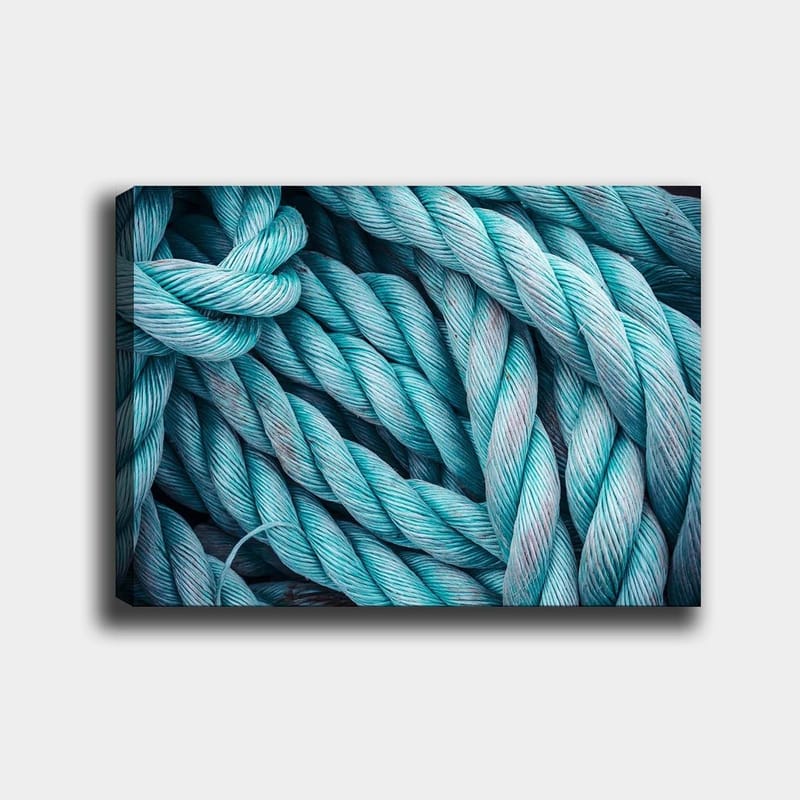 Lærred 70x100 cm - Nærbillede af sammenflettede reb, der skaber en dynamisk og tekstureret komposition - Turkis / Lyseblå - Boligtilbehør - Billeder & kunst - Billeder på lærred