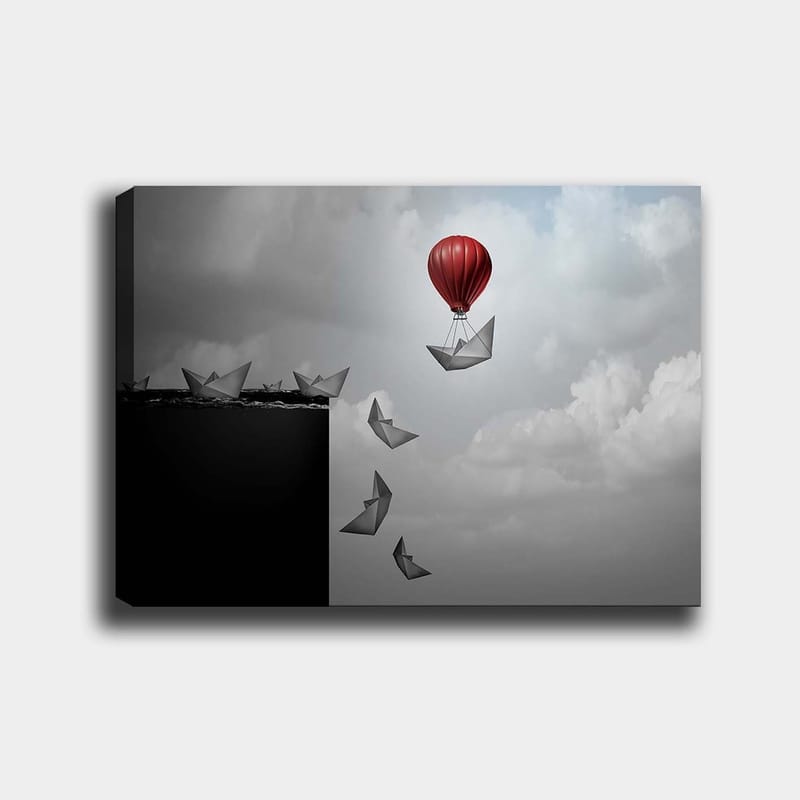 Lærred 70x100 cm - Rød varmluftballon svæver over en sort afgrund med papirbåde svævende nedenunder, Rød / Sort / Grå