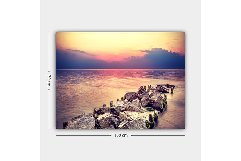 Lærred 70x100 cm - Rolig udsigt over en klippefyldt kystlinje ved solnedgang - Grå / Lyseblå / Pink - Boligtilbehør - Billeder & kunst - Billeder på lærred