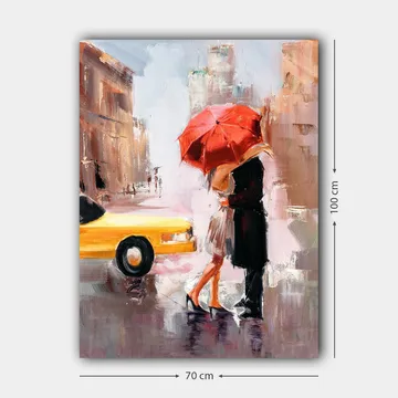 Lærred 70x100 cm - Romantisk kys under en rød paraply i urbane omgivelser - Rød / Sort / Gul - Boligtilbehør - Billeder & kunst - Billeder på lærred