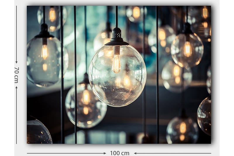 Lærred 70x100 cm - Samling af hængende lyspærer i forskellige størrelser, der skaber en atmosfære af varme og lys - Klar / Sort / Guld - Boligtilbehør - Billeder & kunst - Billeder på lærred