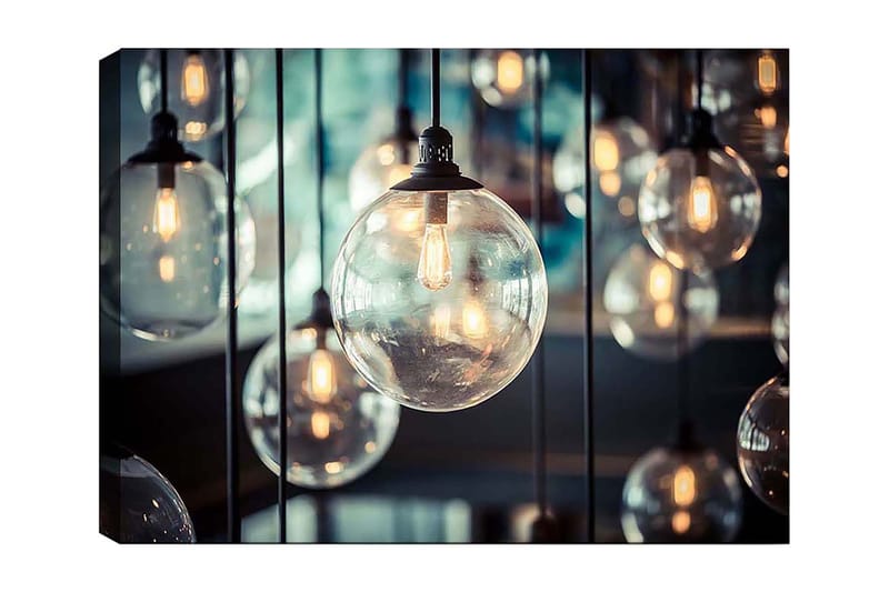 Lærred 70x100 cm - Samling af hængende lyspærer i forskellige størrelser, der skaber en atmosfære af varme og lys, Klar / Sort / Guld