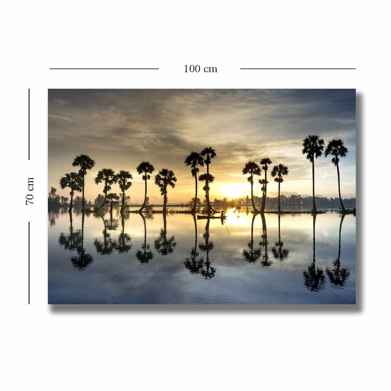 Lærred 70x100 cm - Silhuetter af palmer ved en spejlblank sø ved solnedgang - Guld / Blå / Sort - Boligtilbehør - Billeder & kunst - Billeder på lærred