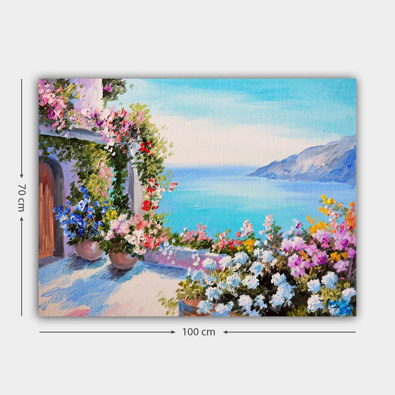 Lærred 70x100 cm - Smuk udsigt over havet med blomsterarrangementer i potter, der pryder en terrasse - Blå / Grøn / Lyserød - Boligtilbehør - Billeder & kunst - Billeder på lærred