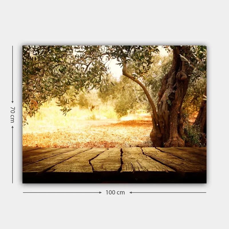 Lærred 70x100 cm - Solbeskinnet landskabsscene med oliventræer og en træoverflade i forgrunden - Guld / Brun / Grøn - Boligtilbehør - Billeder & kunst - Billeder på lærred