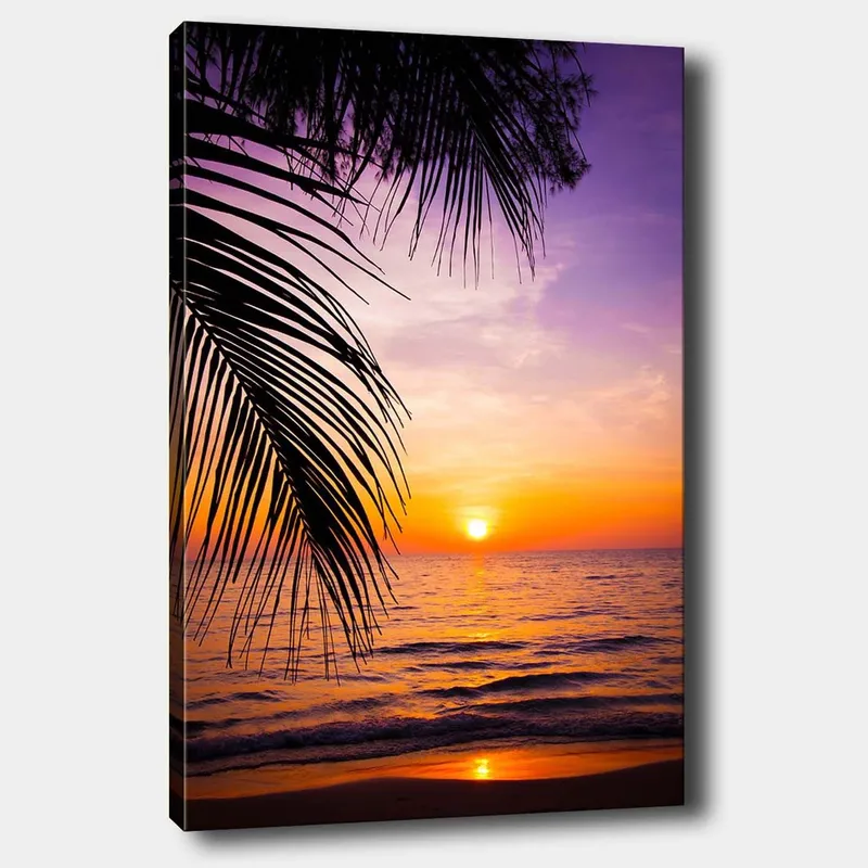 Lærred 70x100 cm - Solnedgang over havet med palmer i forgrunden, Lilla / Orange / Gul