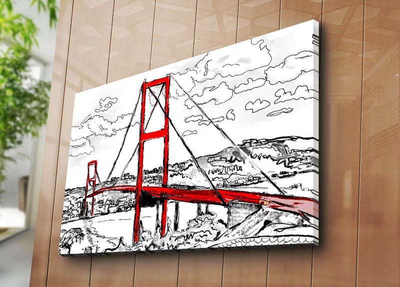 Lærred 70x100 cm - Stiliseret billede af en rød hængebro med omgivende landskab i sort-hvid - Rød / Sort - Boligtilbehør - Billeder & kunst - Billeder på lærred