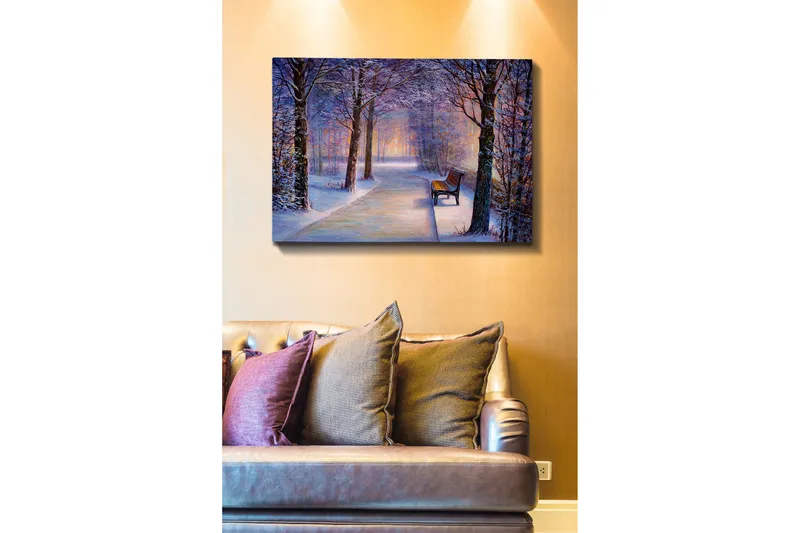 Lærred 70x100 cm - Vintervandring med snedækkede træer og en ensom bænk langs en sti, Blå / Hvid / Grå