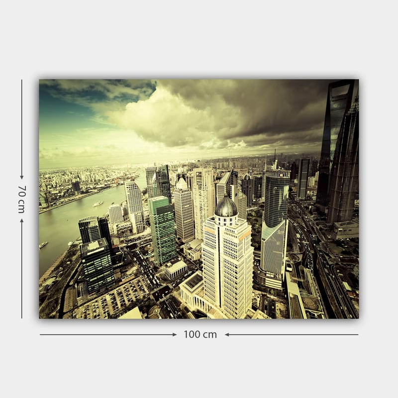 Lærred 70x100 cm - Panoramaudsigt over en moderne by med høje skyskrabere og en flod, der flyder gennem landskabet - Grøn / Grå / Beige - Boligtilbehør - Billeder & kunst - Billeder på lærred