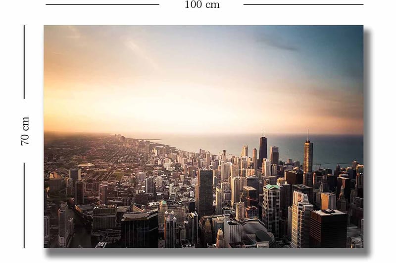 Lærred 70x100 cm - Panoramaudsigt over en by med høje skyskrabere og en solnedgang, der skaber en dramatisk atmosfære - Blå / Orange / Grå - Boligtilbehør - Billeder & kunst - Billeder på lærred
