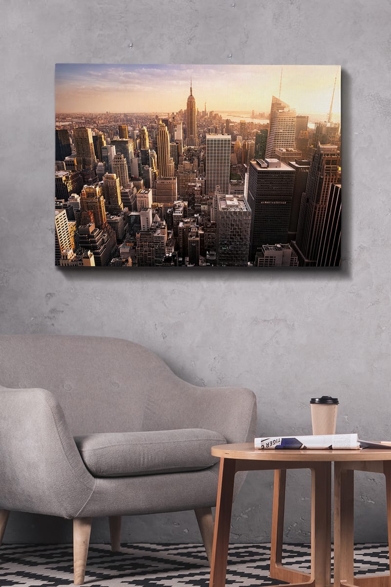 Lærred 70x100 cm - Panoramaudsigt over en by med skyskrabere og den ikoniske Empire State Building ved solnedgang - Guld / Grå / Blå - Boligtilbehør - Billeder & kunst - Billeder på lærred