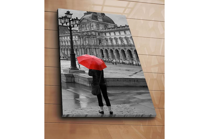 Lærred 70x100 cm - Person stående med en rød paraply i et regnfuldt bymiljø foran en historisk bygning - Rød / Sort - Boligtilbehør - Billeder & kunst - Billeder på lærred