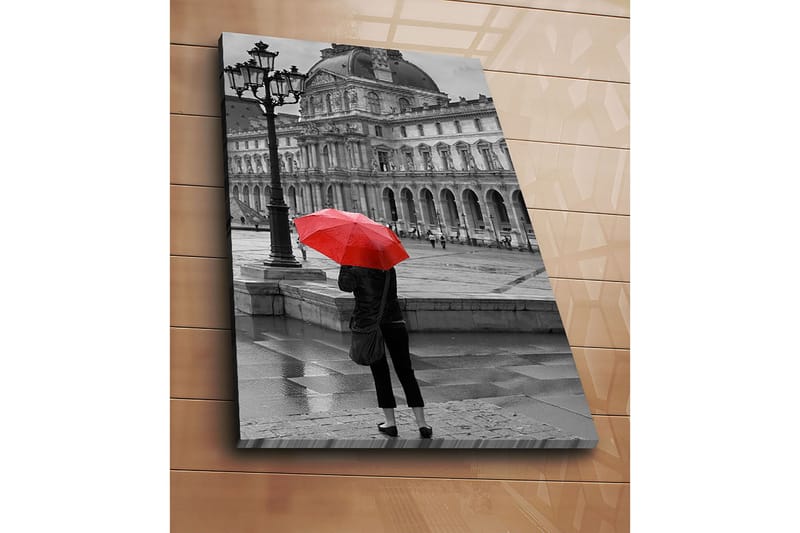 Lærred 70x100 cm - Person stående med en rød paraply i et regnfuldt bymiljø foran en historisk bygning - Rød / Sort - Boligtilbehør - Billeder & kunst - Billeder på lærred