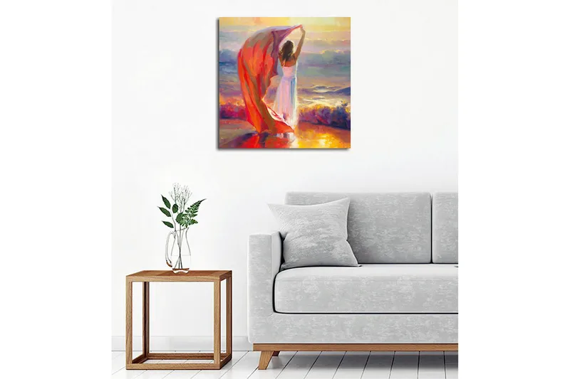 Lærredsbillede - Kvinde holder et rødt sjal op ved havet - Rød / Hvid / Blå - Boligtilbehør - Billeder & kunst - Billeder på lærred