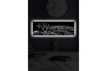 Lærredsbillede med LED-belysning 30x90 cm - Musiker spiller violin med en bysilhuet i baggrunden - Sort / Hvid - Boligtilbehør - Billeder & kunst - Billeder på lærred