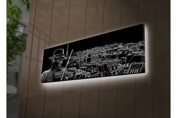 Lærredsbillede med LED-belysning 30x90 cm - Musiker spiller violin med en bysilhuet i baggrunden - Sort / Hvid - Boligtilbehør - Billeder & kunst - Billeder på lærred
