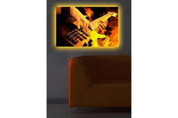 Lærredsbillede med LED-belysning 45x70 cm - Guitarist spiller elektrisk bas omgivet af flammende flammer - Orange / Sort / Gul - Boligtilbehør - Billeder & kunst - Billeder på lærred