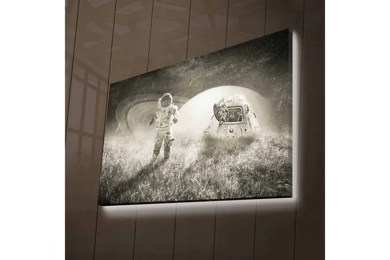 Lærredsbillede med LED-belysning - Astronaut i et futuristisk landskab med et rumskib, Sort / Hvid / Grå