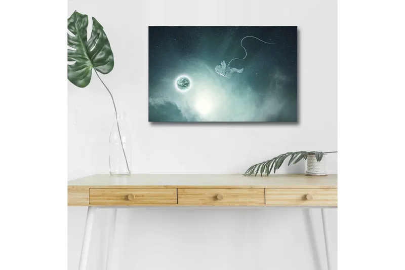 Lærredsbillede med LED-belysning - Astronaut svæver i rummet med en planet i baggrunden, Mørkeblå / Grøn / Hvid