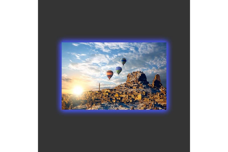 Lærredsbillede med LED-belysning - Farverige varmluftsballoner svæver over et bjergrigt landskab med solnedgang - Guld / Blå / Orange - Boligtilbehør - Billeder & kunst - Billeder på lærred