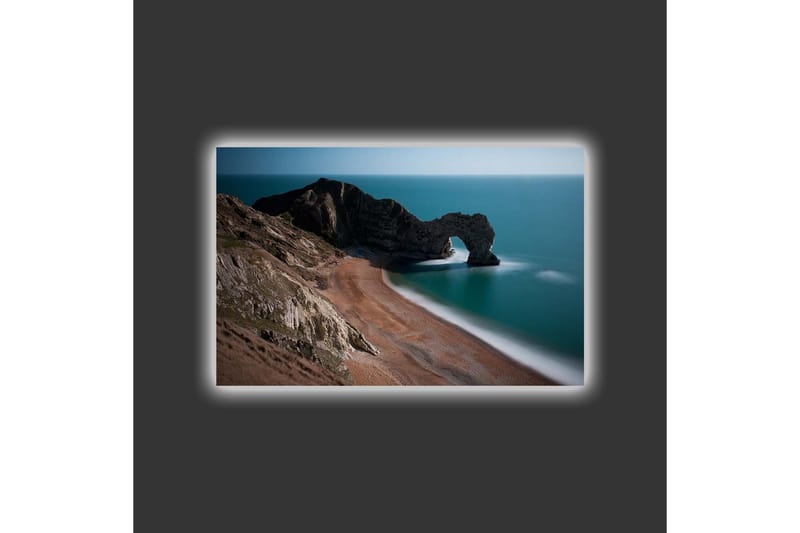 Lærredsbillede med LED-belysning - Klippeformation med naturlig bue på kysten - Mørkegrøn / Blå / Beige - Boligtilbehør - Billeder & kunst - Billeder på lærred