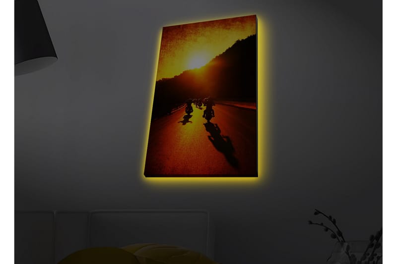 Lærredsbillede med LED-belysning - Motorcykler kører langs en vej i solnedgangens gyldne lys - Guld / Orange / Sort - Boligtilbehør - Billeder & kunst - Billeder på lærred