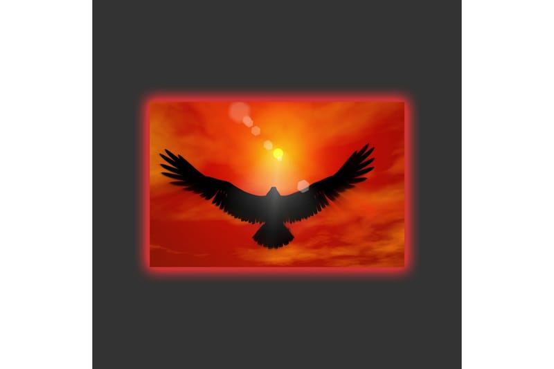Lærredsbillede med LED-belysning - Silhuet af en ørn, der flyver mod en solnedgang i klare farver - Rød / Sort / Orange - Boligtilbehør - Billeder & kunst - Billeder på lærred