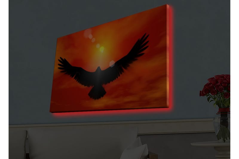Lærredsbillede med LED-belysning - Silhuet af en ørn, der flyver mod en solnedgang i klare farver - Rød / Sort / Orange - Boligtilbehør - Billeder & kunst - Billeder på lærred