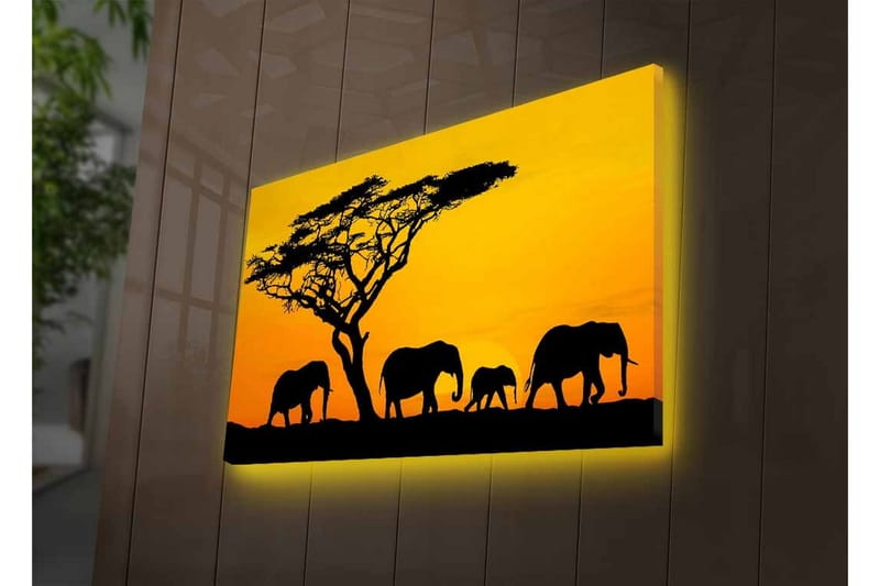 Lærredsbillede med LED-belysning - Silhuetter af elefanter under en solnedgang med et træ i baggrunden - Sort / Orange / Gul - Boligtilbehør - Billeder & kunst - Billeder på lærred