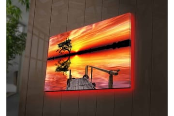 Lærredsbillede med LED-belysning - Smuk solnedgang over en spejlblank sø med en ensom træbanke - Orange / Gul / Sort - Boligtilbehør - Billeder & kunst - Billeder på lærred