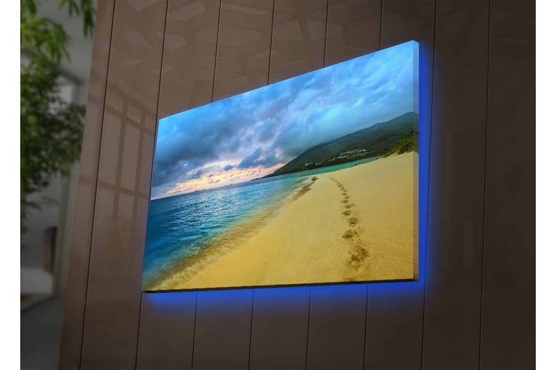 Lærredsbillede med LED-belysning - Smuk strand med fodspor i sandet og en dramatisk himmel - Blå / Sandgul / Grå - Boligtilbehør - Billeder & kunst - Billeder på lærred
