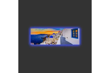 Lærredsbillede med LED-belysning - Smuk udsigt over hvide huse med blå kupler mod havet og en farverig solnedgang - Blå / Hvid / Orange - Boligtilbehør - Billeder & kunst - Billeder på lærred