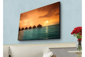 Lærredsbillede med LED-belysning - Solnedgang over en tropisk strand med bungalows over vandet - Orange / Turkis - Boligtilbehør - Billeder & kunst - Billeder på lærred